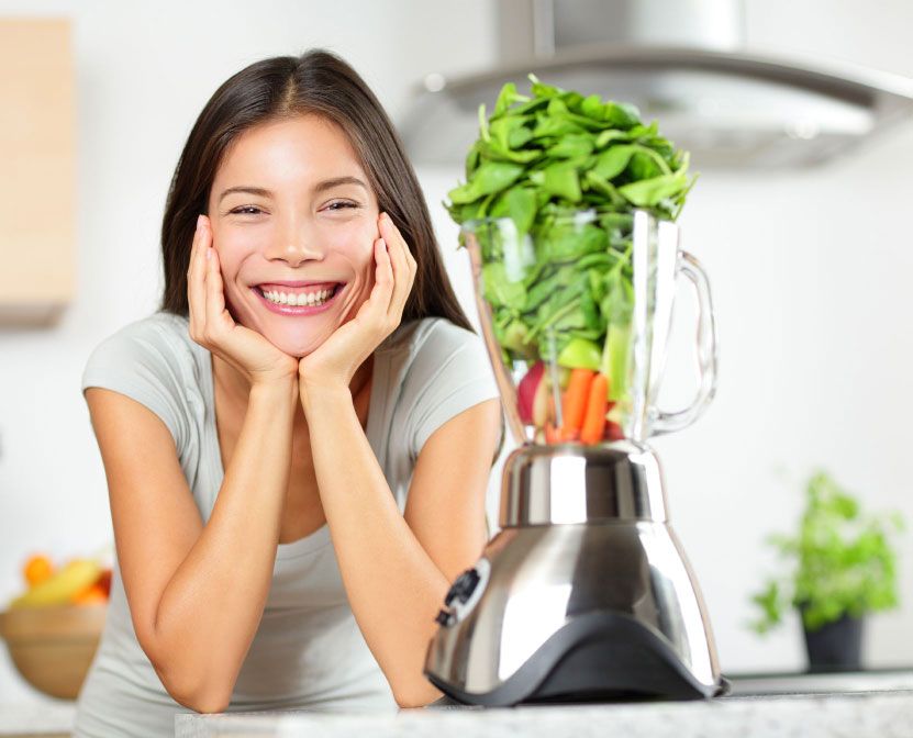 Person Smiling with Vegetables in Blender Person Smiling with Vegetables in Blender